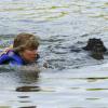 Alex swimming with owner/handler Liz Volz.  Photo by Stewart Event Images