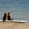 Slipper and her "mom" Missy on the paddle board pondering the day.